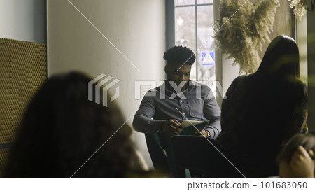 African American man shares stories with woman African American man shares stories with woman 101683050