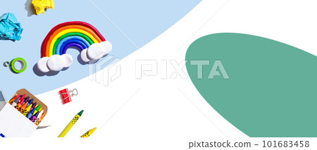 School supplies with a rainbow - overhead view 101683458