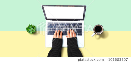 Person using a laptop computer 101683507