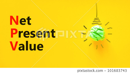 NPV net present value symbol. Concept words NPV net present value on yellow paper on a beautiful yellow background. Green light bulb icon. Business and NPV net present value concept. Copy space. 101683743