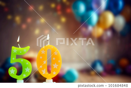Happy birthday card with candle number 50 against festive background with balloons and Birthday cake. Copy space happy birthday for fifty years. Celebrating Happy birthday card with candle number 50 against festive background with balloons and Birthday cake. Copy space happy birthday for fifty years. Celebrating 101684848