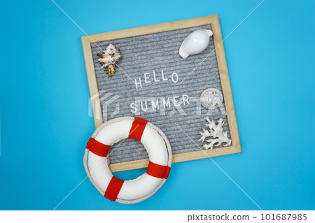 A message on a board that says hello summer 101687985