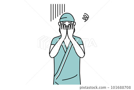 一名抑鬱並摀住臉的男性住院患者 101688708