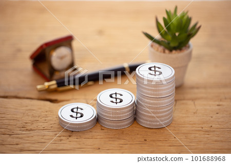 Money (dollars) stacked on the table Money (dollars) stacked on the table 101688968