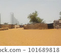Abu Dhabi desert and buildings 101689818