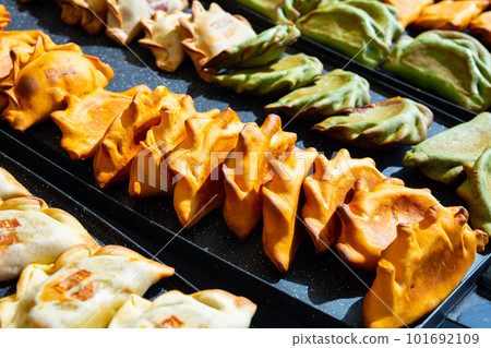 Empanada - popular dish on the Iberian Peninsula and in Latin America 101692109