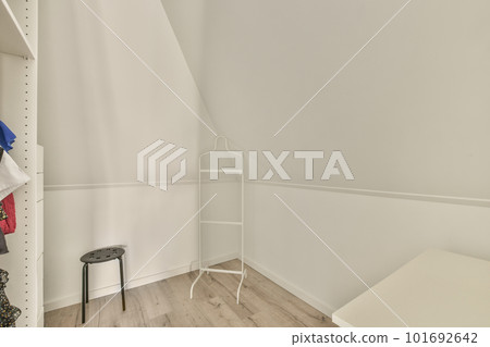 Small window of corridor located on top of staircase in modern house 101692642