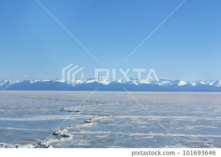 Frozen Lake and Snowy Mountains Winter Landscape Frozen Lake and Snowy Mountains Winter Landscape 101693646