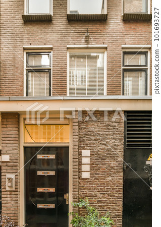 a brick building with an oven on the door and two bikes parked in front of it, both side by side a brick building with an oven on the door and two bikes parked in front of it, both side by side 101693727
