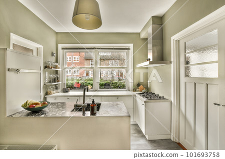 a kitchen that is very clean and ready for us to use as an appliance or part of the house a kitchen that is very clean and ready for us to use as an appliance or part of the house 101693758