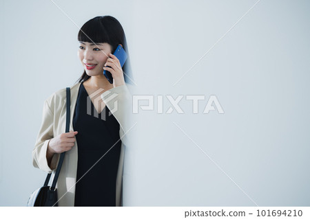 Business woman with smartphone Business woman with smartphone 101694210