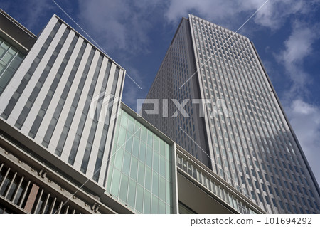 Landscape of the office town looking up at a skyscraper Landscape of the office town looking up at a skyscraper 101694292