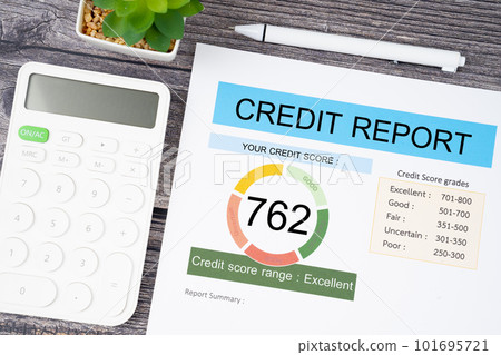 The Credit score report document and pen with calculator on the desk. The Credit score report document and pen with calculator on the desk. 101695721