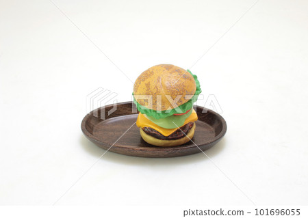 a Tasty hamburger isolated on white background a Tasty hamburger isolated on white background 101696055