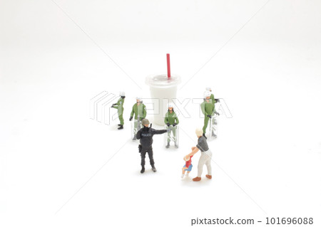 a police officer stops a kid from reaching soft drink a police officer stops a kid from reaching soft drink 101696088