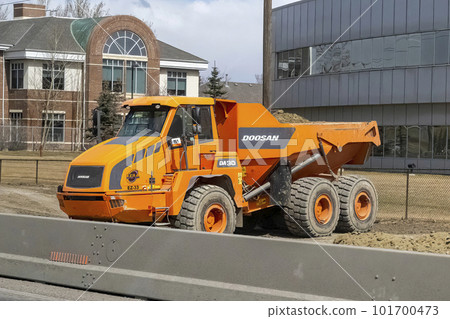 Calgary, Alberta, Canada. Apr 18, 2023. A Doosan DA 30-5 articulated dump truck. Calgary, Alberta, Canada. Apr 18, 2023. A Doosan DA 30-5 articulated dump truck. 101700473