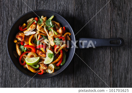 chicken fajitas with bell peppers, onion, spices chicken fajitas with bell peppers, onion, spices 101701625