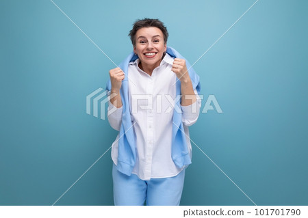 authentic young fashionable dark haired woman with a wide smile 101701790