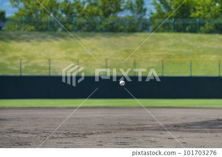 a ball thrown by a pitcher during a baseball game 101703276