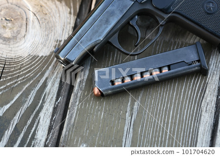 Bullets Near Handgun Bullets Near Handgun 101704620