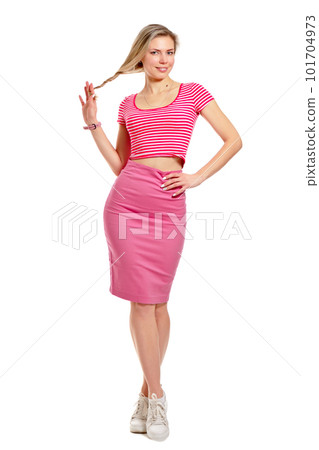 Beautiful young woman gracefully posing in front of the camera. Full length portrait isolated on white background 101704973