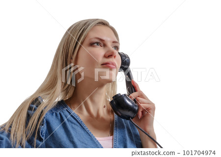 Young beautiful woman talking on vintage landline phone. Isolation on a white background 101704974