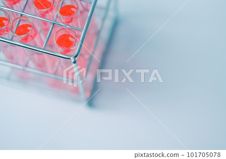 Test tube filled red chemicals sample for experimental in chemistry science laboratory. Glassware in medical research. Scientific lab for Biotechnology Test tube filled red chemicals sample for experimental in chemistry science laboratory. Glassware in medical research. Scientific lab for Biotechnology 101705078