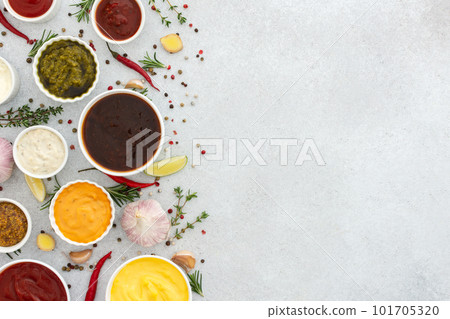 Different types of sauces in bowls 101705320