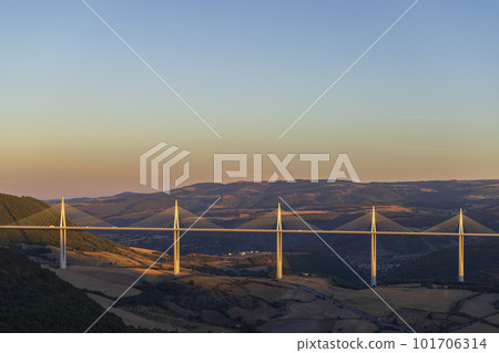 Multi-span cable stayed Millau Viaduct across gorge valley of Tarn River, Aveyron Departement, France Multi-span cable stayed Millau Viaduct across gorge valley of Tarn River, Aveyron Departement, France 101706314