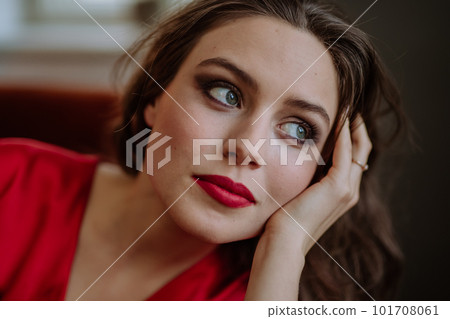 Portrait of young woman with evening make-up. Portrait of young woman with evening make-up. 101708061
