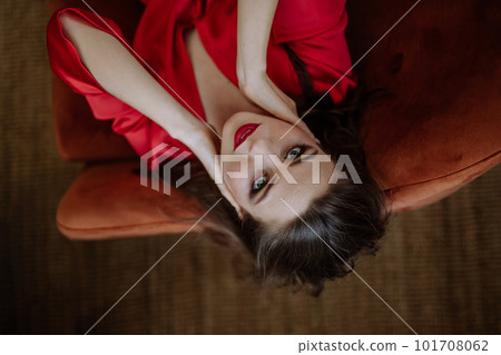 Top view of young woman with evening make-up. Top view of young woman with evening make-up. 101708062