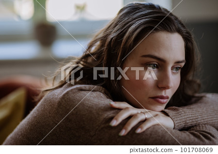 Portrait of unhappy young woman, concept of mental health. 101708069