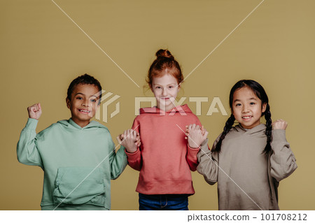 Portrait of three children, studio shoot. Concept of diversity in friendship. Portrait of three children, studio shoot. Concept of diversity in friendship. 101708212