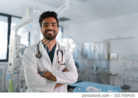 Portrait of middle eastern surgeon in hospital. 101708430