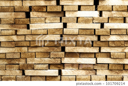 Wood timber construction material background and texture. Stack of lumber,Natural wooden background. 101709214