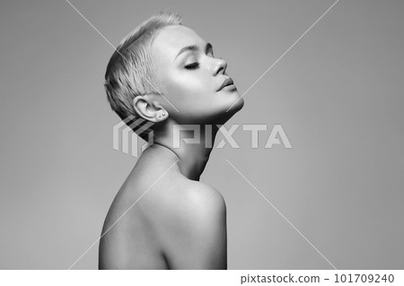 Short Hair Beautiful young woman. sensual girl with blond Hair 101709240