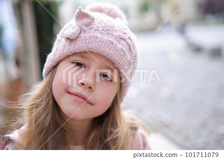 Portrait of cute little child girl in pink hat Portrait of cute little child girl in pink hat 101711079