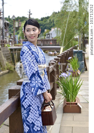 The streets of Little Edo Sawara and a young woman in a beautiful yukata 101713252