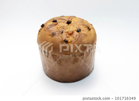Isolated Panettone Italian Christmas Cake On White Background. Fruitcake, Sweet bread, Originally From Milan, Italy. Pastry Dessert. Horizontal plane. Isolated Panettone Italian Christmas Cake On White Background. Fruitcake, Sweet bread, Originally From Milan, Italy. Pastry Dessert. Horizontal plane. 101716349