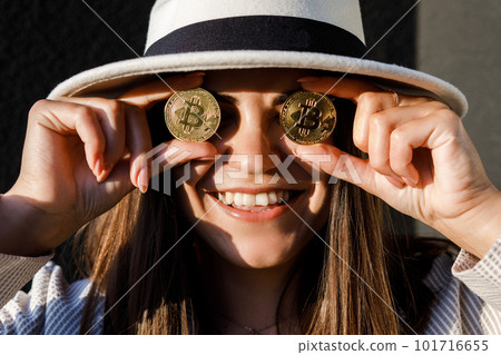 Beautiful girl in glasses from bitcoin. Bitcoin cryptocurrency. Sexy woman with bitcoin isolated on outdoor. Bull market. 101716655