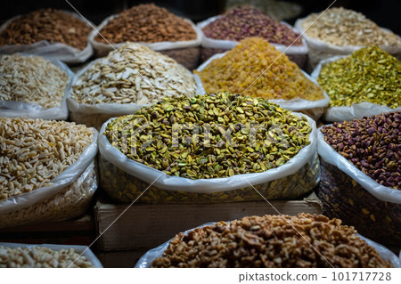 Bag of pistachios and nuts for sale on snack market, Suq Bag of pistachios and nuts for sale on snack market, Suq 101717728