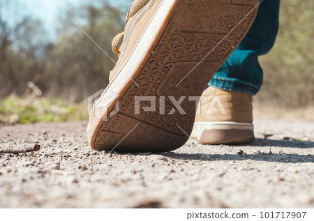 Lifestyle walk on road in forest sneakers Lifestyle walk on road in forest sneakers 101717907