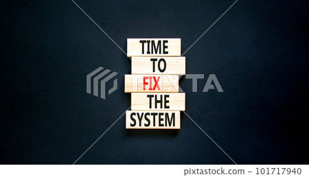 Time to fix the system symbol. Concept words Time to fix the system on wooden block. Beautiful black table black background. Business and time to fix the system concept. Copy space. 101717940