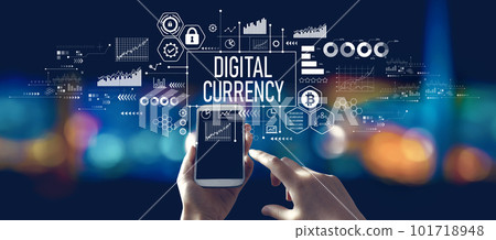 Digital currency theme with person using a smartphone at night Digital currency theme with person using a smartphone at night 101718948