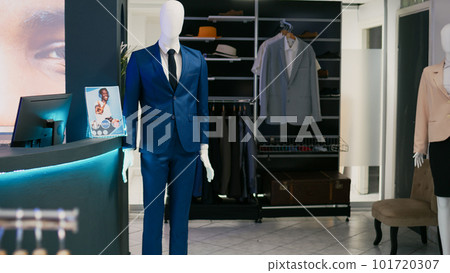 Empty clothing store for modern people and clients, commercial activity with clothes in fashion boutique shop. Modern trendy new collections of casual wear in shopping center, small business. 101720307