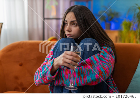 Sad depressed young woman girl suffers from unrequited love, drinking champagne, problem, bad news Sad depressed young woman girl suffers from unrequited love, drinking champagne, problem, bad news 101720463