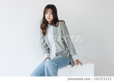 Half woman sitting on a white block Half woman sitting on a white block 101721513