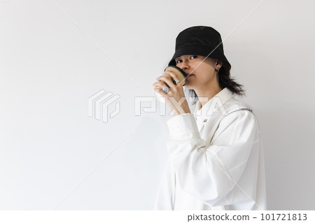 Man drinking coffee from a chilled cup 101721813