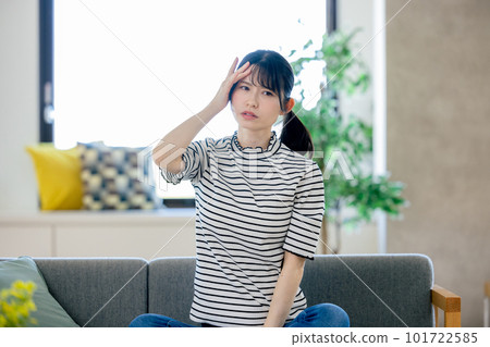 A young woman with poor physical condition A young woman with poor physical condition 101722585