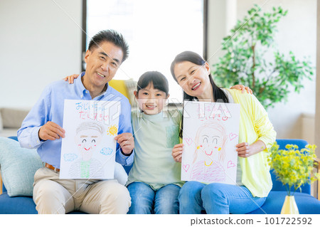 Respect for the Aged Day Grandparents receiving portraits from their grandchildren Respect for the Aged Day Grandparents receiving portraits from their grandchildren 101722592